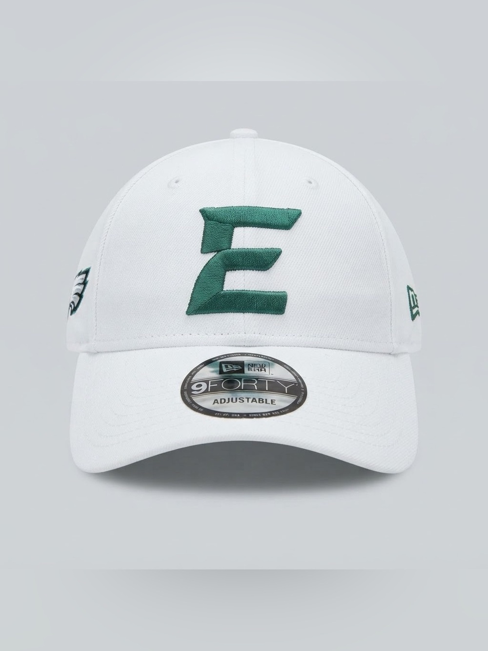 New Era White Hat with Dark Green Embroidered E
